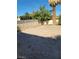Enclosed backyard featuring partial perimeter block wall and desert landscaping at 1413 Bryn Mawr Ave, Las Vegas, NV 89102
