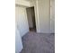 Hallway showcasing potential for connecting spaces with neutral carpet at 1413 Bryn Mawr Ave, Las Vegas, NV 89102