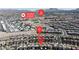 Aerial view of a community highlighting location and nearby amenities, including schools, streets, and residential homes at 156 Campbelltown Ave, Henderson, NV 89015