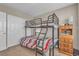 Bedroom featuring a bunk bed with a closet and a nightstand at 156 Campbelltown Ave, Henderson, NV 89015