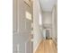 Inviting entryway with wood-look floors, tall ceilings, and a stairway to the upper level at 156 Campbelltown Ave, Henderson, NV 89015