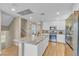 Well-designed kitchen with an island, stainless steel appliances, and open layout at 156 Campbelltown Ave, Henderson, NV 89015