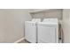 Functional laundry room features modern, full-sized washer and dryer at 156 Campbelltown Ave, Henderson, NV 89015