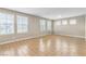 Bright living room with tile flooring, lots of natural light, and neutral wall colors at 156 Campbelltown Ave, Henderson, NV 89015