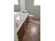 Bathroom featuring a large vanity with a countertop, wood cabinets, and tile flooring at 167 Desert Pond Ave, Henderson, NV 89002