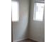 Bedroom featuring dual windows and neutral carpet at 167 Desert Pond Ave, Henderson, NV 89002