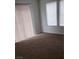 Bedroom with large windows and blinds at 167 Desert Pond Ave, Henderson, NV 89002