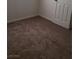 Bedroom with plush neutral carpet and bright white trim throughout the room at 167 Desert Pond Ave, Henderson, NV 89002