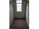 Spacious walk-in closet with carpeted floor and a window at 167 Desert Pond Ave, Henderson, NV 89002