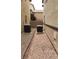 Narrow side yard with gravel, two air conditioning units, and the exterior of the house at 167 Desert Pond Ave, Henderson, NV 89002
