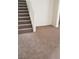 Carpeted staircase with white railing and natural light at 167 Desert Pond Ave, Henderson, NV 89002
