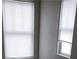 Two windows with white blinds, letting in soft light at 167 Desert Pond Ave, Henderson, NV 89002