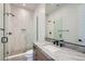 Elegant bathroom featuring glass shower enclosure and granite countertop at 182 Robledo St, Las Vegas, NV 89138
