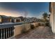 Inviting front yard with low walls, brick pavers, a stylish gate, and landscaped features, offering privacy and curb appeal at 182 Robledo St, Las Vegas, NV 89138