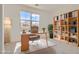 Bright home office with mountain views, a desk setup, and ample shelving for storage at 182 Robledo St, Las Vegas, NV 89138