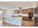 Bright kitchen featuring stainless appliances, modern fixtures, and an oversized kitchen island at 182 Robledo St, Las Vegas, NV 89138