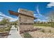 Neighborhood sign for 'Acadia Ridge' set in a landscaped area adding to the charm of the community at 182 Robledo St, Las Vegas, NV 89138