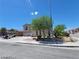 Two-story house with desert landscaping, blue sky and a visible driveway at 206 Valerian St, Henderson, NV 89015