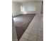 Living room featuring carpeted floors, large windows, and ample sunlight at 206 Valerian St, Henderson, NV 89015