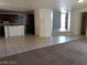 Open-concept living room featuring kitchen, and lots of natural light at 206 Valerian St, Henderson, NV 89015