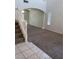 Spacious carpeted living room with high ceilings and abundant natural light at 206 Valerian St, Henderson, NV 89015