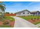 Charming home with well-manicured lawn and a long driveway at 2257 Colebrook St, Las Vegas, NV 89115
