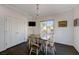 Cozy dining nook featuring wood floors, and a view of the outdoors at 2261 Evening Lights St, Henderson, NV 89052