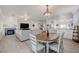 Bright dining room open to the living room, great for entertaining at 2261 Evening Lights St, Henderson, NV 89052