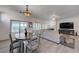 Bright dining room open to the living room, great for entertaining at 2261 Evening Lights St, Henderson, NV 89052