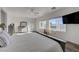 Main bedroom with a large window view of pool and mountain at 2261 Evening Lights St, Henderson, NV 89052