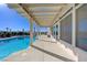 Refreshing backyard pool with concrete patio, offering a serene retreat for relaxation and outdoor activities in the sun at 2261 Evening Lights St, Henderson, NV 89052