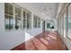 Bright sunroom with tiled floors and large windows overlooking the outdoor space at 2261 Evening Lights St, Henderson, NV 89052