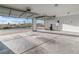 Spacious garage with an open door, polished concrete floors and ample storage space at 2261 Pampa Ave, Pahrump, NV 89048