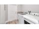 Laundry room with granite counter, utility sink, washer, and dryer at 2261 Pampa Ave, Pahrump, NV 89048