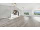 Bright, open living room with vaulted ceiling, fireplace and large windows at 2261 Pampa Ave, Pahrump, NV 89048
