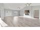 Open living room with a sleek fireplace and plenty of natural light at 2261 Pampa Ave, Pahrump, NV 89048