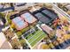 An aerial view of tennis courts, bocce ball and shuffleboard courts at the community center at 2365 Black River Falls Dr, Henderson, NV 89044