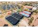 Community aerial view featuring tennis courts, well-manicured landscaping, and amenities at 2365 Black River Falls Dr, Henderson, NV 89044
