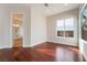 Bedroom boasts hardwood floors, neutral paint, and bright natural light at 2365 Black River Falls Dr, Henderson, NV 89044