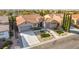 A lovely single-story home boasting professional landscaping, a paved drive, and a terracotta tile roof at 2365 Black River Falls Dr, Henderson, NV 89044