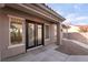 Front porch featuring glass paneled double doors and decorative pillars, creating an inviting entry at 2365 Black River Falls Dr, Henderson, NV 89044