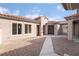 Charming home exterior showcasing a well-maintained front yard and stucco facade at 2365 Black River Falls Dr, Henderson, NV 89044