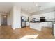 Spacious kitchen with an island, stainless steel appliances, and white cabinets at 2365 Black River Falls Dr, Henderson, NV 89044
