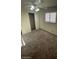 Bedroom with neutral tones, carpet flooring, and a closet at 2564 San Marcos St, Las Vegas, NV 89115