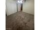 Bedroom featuring neutral tones, carpet flooring, and a closet at 2564 San Marcos St, Las Vegas, NV 89115