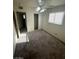Bedroom featuring neutral tones, carpet, a ceiling fan and closet at 2564 San Marcos St, Las Vegas, NV 89115