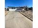 View of the front of the home with a concrete driveway and easy street access at 2564 San Marcos St, Las Vegas, NV 89115