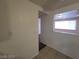 Hallway with tile flooring looking into a living room area at 2564 San Marcos St, Las Vegas, NV 89115