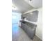 Updated kitchen with gray cabinets and stone countertops at 2564 San Marcos St, Las Vegas, NV 89115