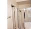 Bathroom showcasing a glass-enclosed shower with tile surround and modern fixtures at 2720 Knightsbridge Rd, Henderson, NV 89074
